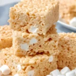 Stacked rice krispie treat squares with marshmallows