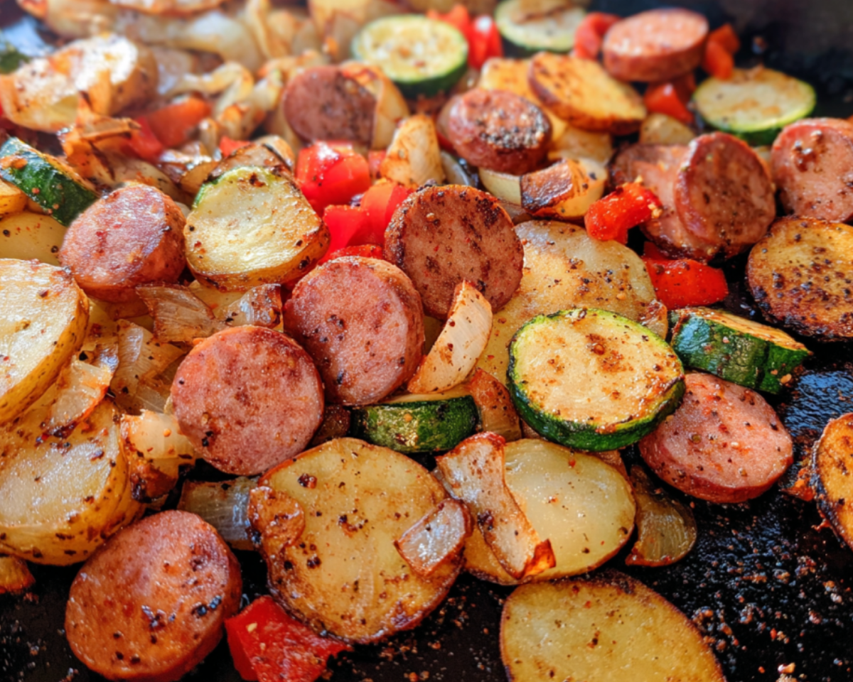 cowboy stir fry on griddle sausage potatoes vegetables
