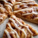 Cinnamon sugar pizza slice with glaze