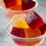 Colorful jello cubes in bowl