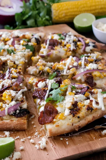 Mexican street corn bacon pizza